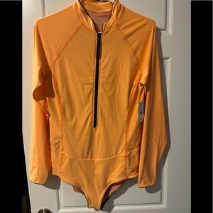 JCrew one piece rash guard with open front size 12, apricot